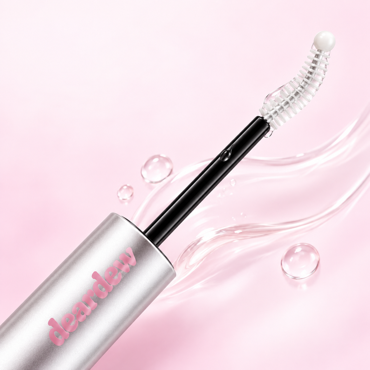 Detail of DearDew clear serum applicator with C-curl brush and rounded ball tip